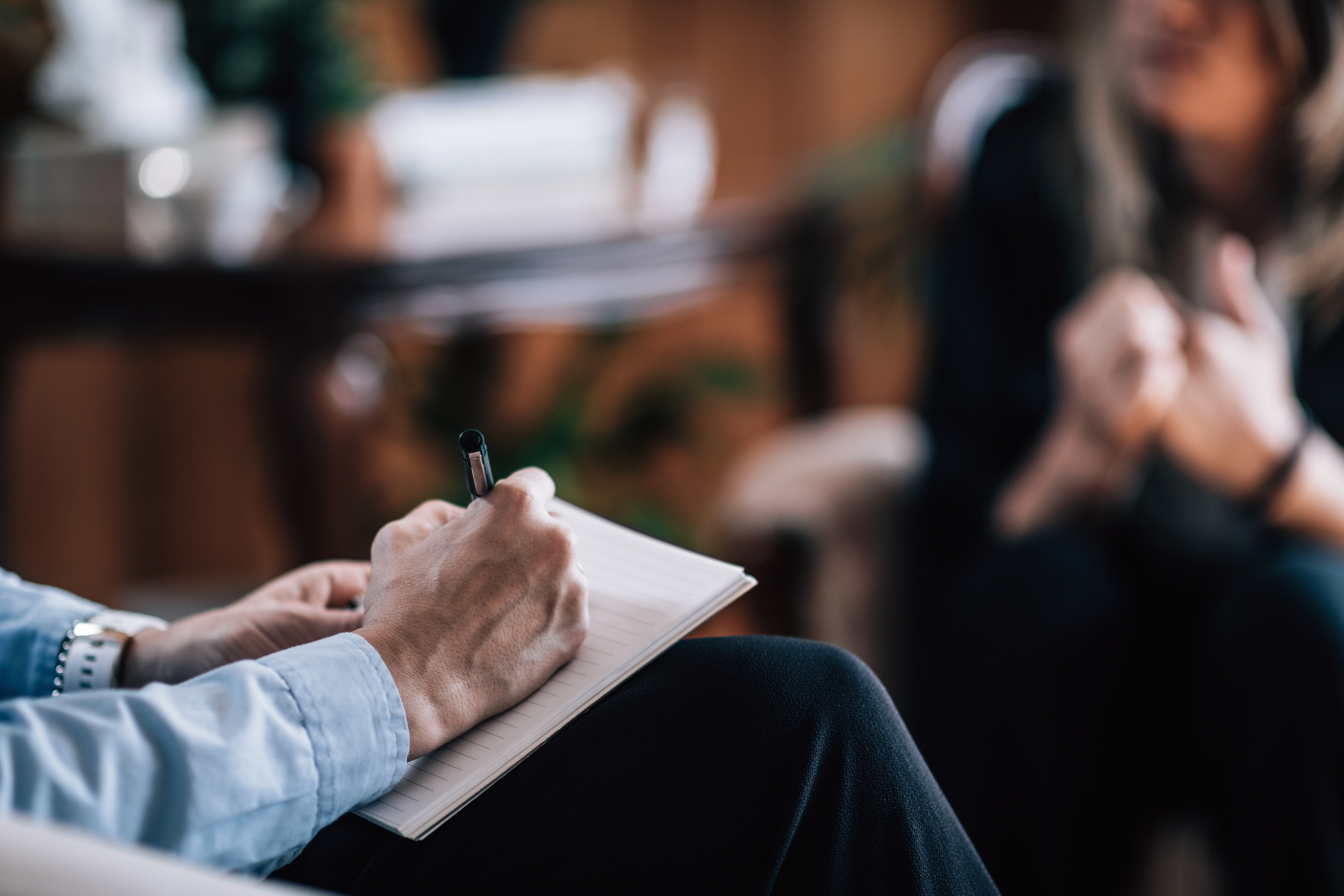 Doctor writing down notes